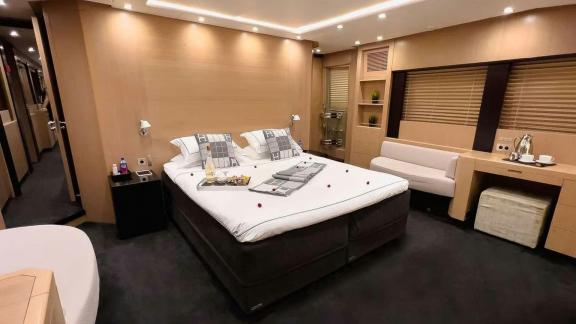 Among Mallorca yacht charter options Ycm120 shows spacious cabin and luxury stay.