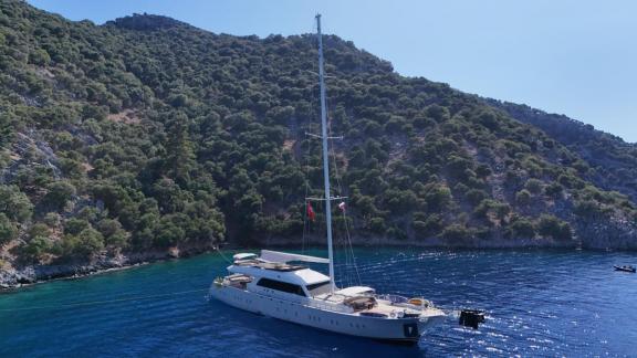 Anchored in Fethiye bay the 6 cabin 12 guest Dodo motorsailer ideal for yacht charter and blue cruise holiday.