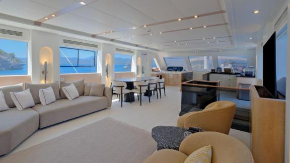 Among Fethiye yacht charter options the 6 cabin 12 guest Dodo motorsailer features a bright saloon with sea views.