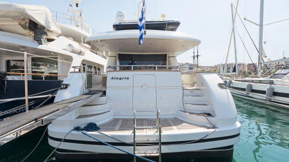 The motor yacht Alegria in the Athens harbor, a perfect choice for luxury charter experiences.