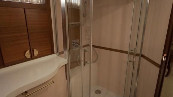 The Ayem yacht features a sleek modern shower in every bathroom for your Göcek charter.