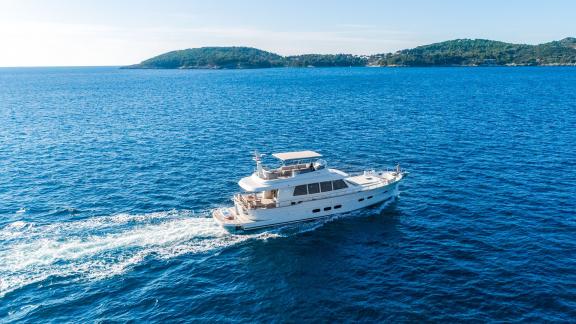 The Menorquin 68 FB yacht Cloud 9 is cruising off Dubrovnik offering an immersive marine experience in tranquil waters.