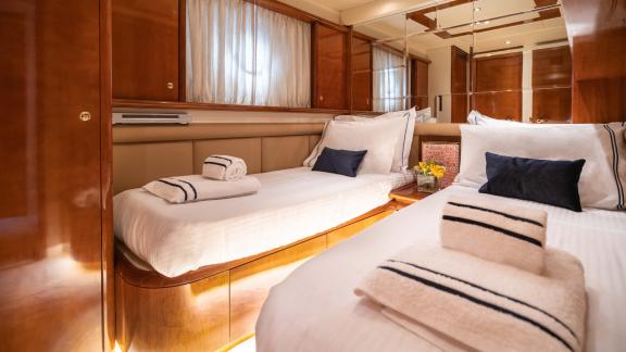 The twin bed guest cabin of the yacht Estia Zeus offers comfortable and elegant accommodation.