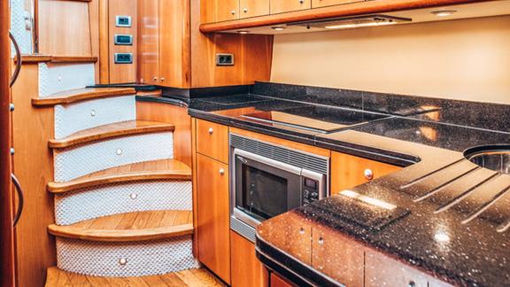 Modern kitchen with sleek wood finishes and compact design.