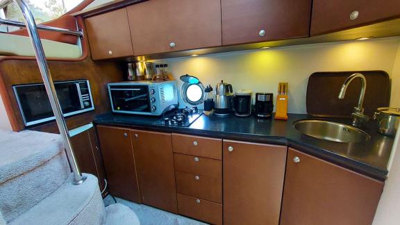 The kitchen of motor yacht Germanor offers comfortable meal preparation with modern appliances and ample counter space.