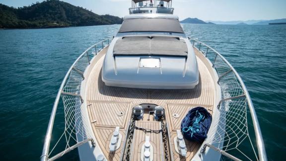 Wide and stylish foredeck of the Hurrem motor yacht with a sea view.