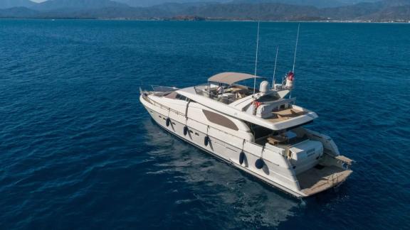 The Hurrem motor yacht is seen anchored in the open sea.