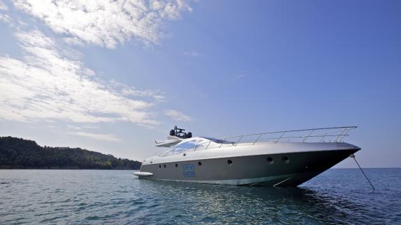 The magnificent motor yacht Thea Malta anchored off the idyllic coastlines of Greece. Perfect for luxurious excursions.