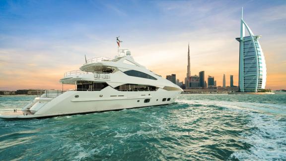 The Lucien motor yacht is perfect for hourly yacht rentals with a stunning view of the Burj Al Arab in Dubai.