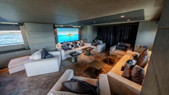 The modern living room of Tatii 2 offers a unique yacht rental experience in Dubai.