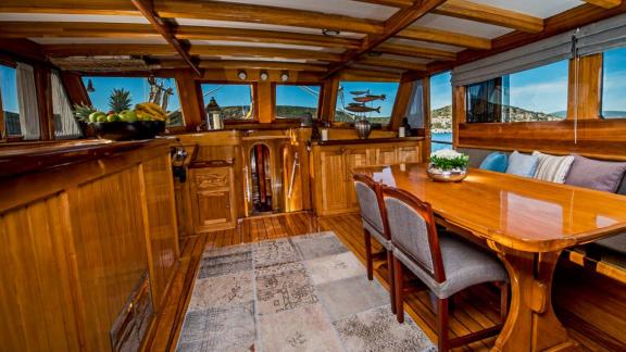 Elegant and comfortable dining area inside Gulet Nikola. Perfect for cozy onboard meals.