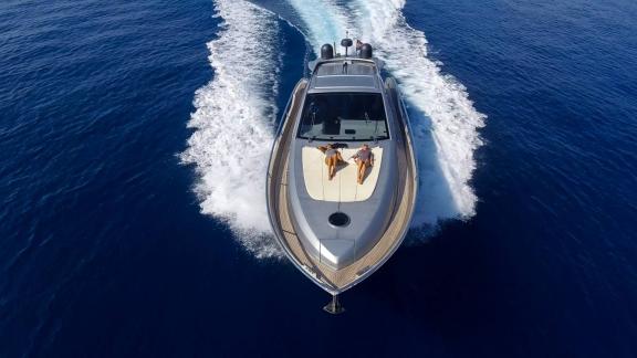 Guests are seen relaxing on the foredeck of Silver Arrow while cruising in the waters off Split.