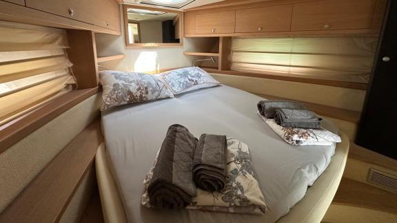 The guest cabin of Silver Arrow in Split features a double bed, natural light and comfortable accommodation.