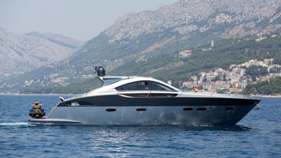 Silver Arrow is seen cruising along the Split coastline, ideal for private yacht rental and day charter trips.