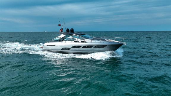 Experience the elegance and performance of Pershing 5X Grey with Dubai daily yacht rental services.