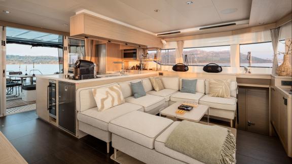 Among catamaran rental options Princess Karla features a modern interior with kitchen and comfortable seating area onboa