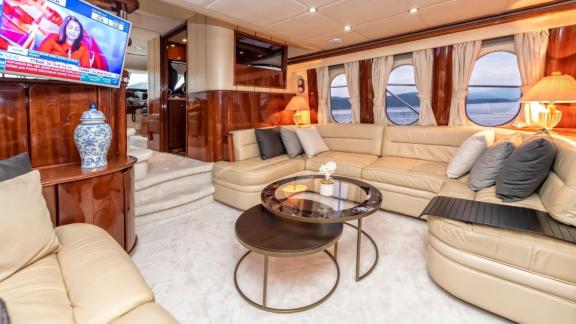 The luxurious interior sitting area on the River S motor yacht combines comfort and style.