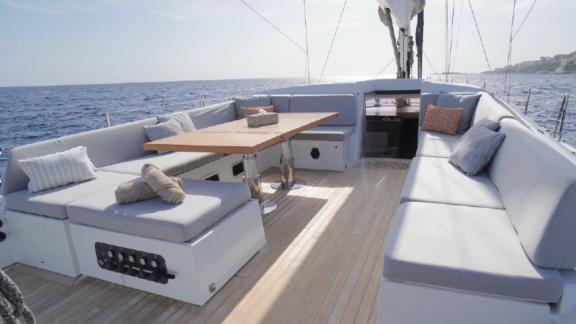 The spacious seating area on Aenea yacht offers a relaxing sea holiday in Croatia.