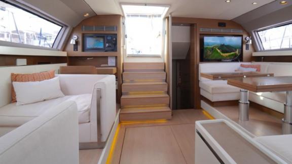 Aenea yacht's modern saloon with TV and comfortable seating areas offers a relaxing holiday.