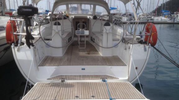 Aft cockpit of sailing yacht Almina docked in the marina.