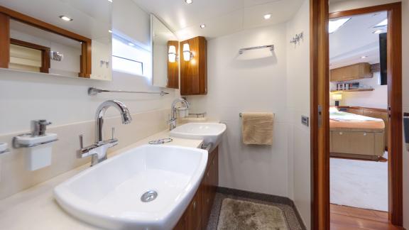 Sailing yacht Bellkara by Conrad YCC91 offers a refined modern bathroom for comfort on board.