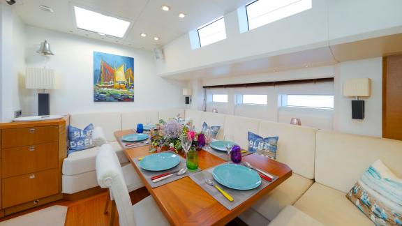 The sailing yacht Bellkara Conrad Shipyard YCC91 features a modern dining space designed for comfort and elegance.
