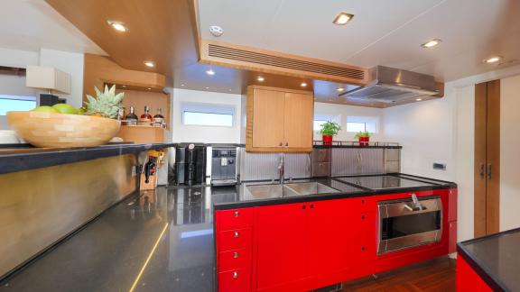 The sailing yacht Bellkara, a Conrad Shipyard YCC91 model, features a fully equipped kitchen space for exceptional onboa