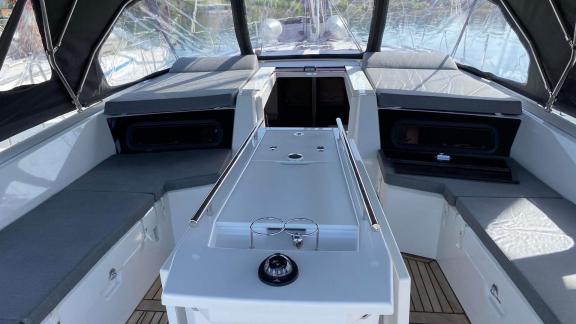 The cockpit of yacht Clio with spacious seating, perfect for a crewless charter.