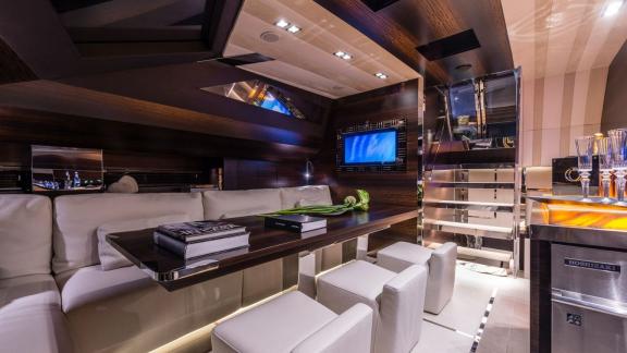 Gigreca’s interior offers a stylish, luxurious feel with dark wood details.