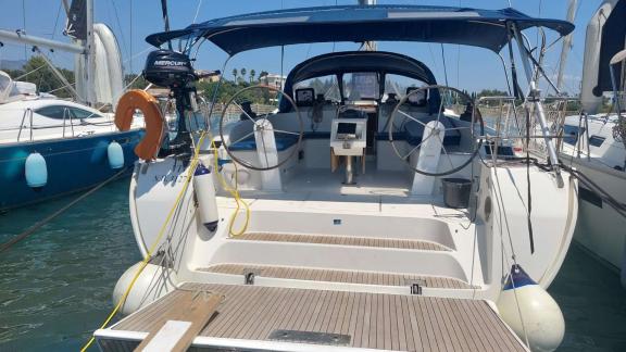 Aft deck area of the sailing yacht Vivi with clearly visible helm and seating area.