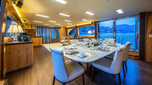Monte Carlo 86 Giorgio offers a refined indoor dining space with scenic sea views and stylish setup.