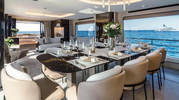 Nemesis motor yacht offers a spacious and stylish dining area in Mallorca.