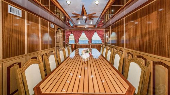 Korab’s refined dining space offers a classy setting for shared meals onboard.