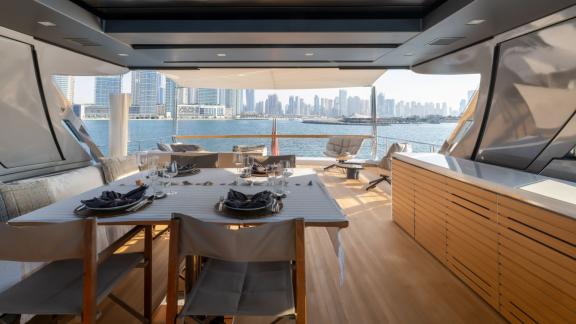 The refined dining area of San Lorenzo Sx88 yacht makes your daily yacht rental in Dubai unforgettable.