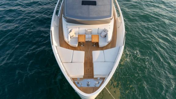 The foredeck of San Lorenzo Sx88 combines comfort and style, ideal for a day yacht rental in Dubai.