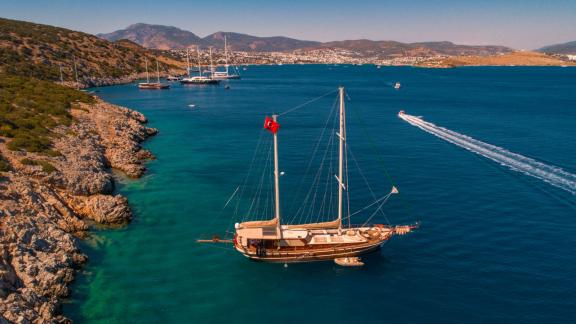 The 24-meter Gulet Sani Kaptan 2 with 4 cabins in the picturesque bay of Bodrum, Turkey.