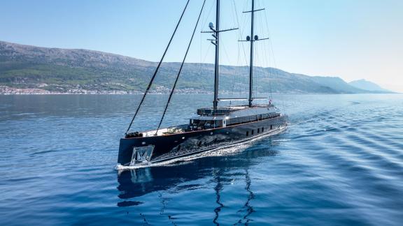 Among Split yacht charter options the 6 cabin 12 guest Scorpios motorsailer cruising at sea.