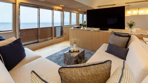 Among Split luxury yacht options the 6 cabin 12 guest Scorpios motorsailer features a TV lounge with sea view.