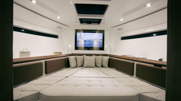 The interior of the Neve motor yacht features a spacious and comfortable sleeping area.