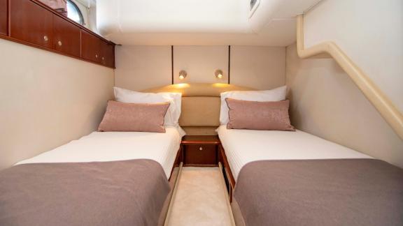 The twin guest cabin of motor yacht NateWhite offers two comfortable beds.