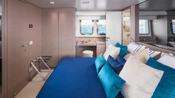 Comfortable master cabin of motor yacht Secundus with sea view, Split, Croatia.