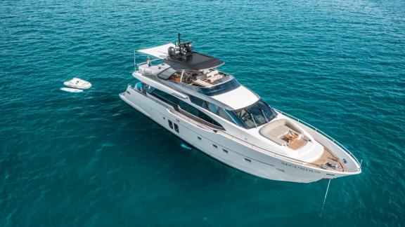 Luxury motor yacht Secundus anchored in turquoise waters, Split, Croatia.