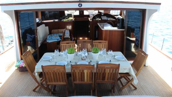 The set table on the Gulet Life is Life offers an inviting space for meals on board.