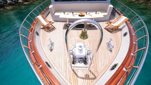 The foredeck of Simay F yacht with a comfortable seating area and sea view offers peaceful relaxation.