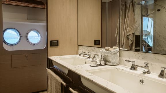 Elegant bathroom with double sinks on the motor yacht Volante.