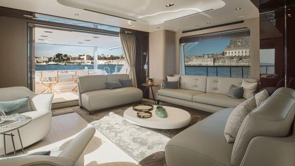 Stylish and comfortable living room aboard the luxurious Volante yacht.