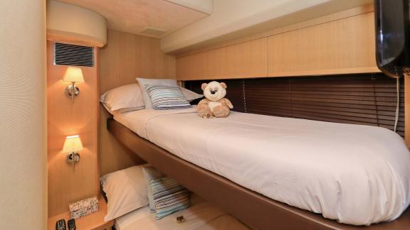 The cozy and child-friendly cabin of motor yacht Spice of Life II is ideal for young guests.