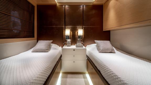 Enjoy the comfortable twin cabin of the motor yacht O'Pati for relaxing nights at sea.