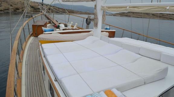 The spacious sun deck of Gulet Tufan 5 offers comfortable lounging areas for relaxing moments at sea.