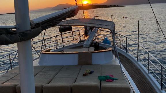 Breathtaking sunset from the deck of the Queen Almila gulet in an idyllic setting.